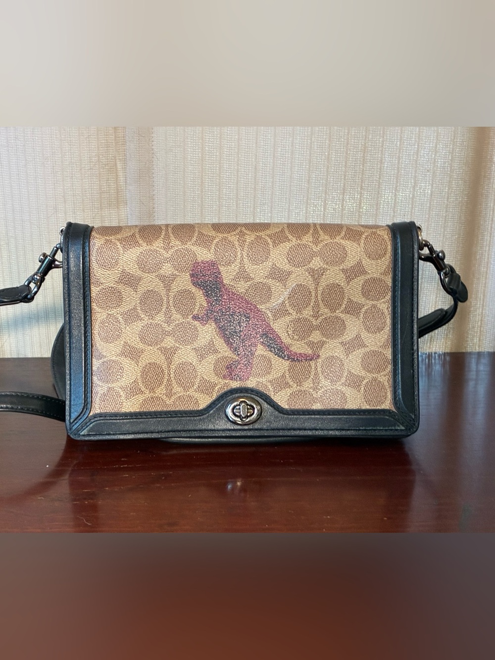 Coach Brown Signature Canvas Crossbody with Black Trim and Dino Motif